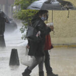 Personas lluvia